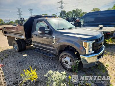 Czwarte zdjęcie samochodu z boku: 2018 FORD F350 SUPER DUTY DUMP TRUCK VIN:1FDRF3H65JEB98557 - miniatura