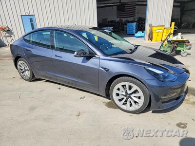 Czwarte zdjęcie samochodu z boku: 2022 TESLA MODEL 3 VIN:5YJ3E1EA8NF188362 - miniatura