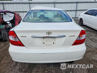 Zdjęcie 6 z 12 samochodu: 2004 TOYOTA CAMRY LE VIN:JTDBE32K640286436 - miniatura