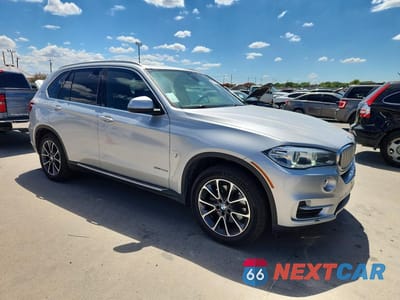Czwarte zdjęcie samochodu z boku: 2018 BMW X5 XDR40E VIN:5UXKT0C56J0W02537 - miniatura