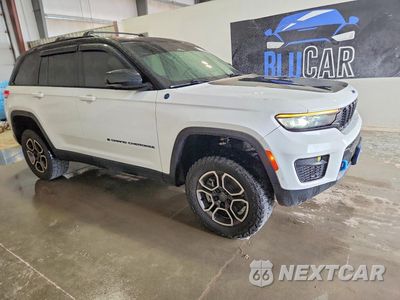 Czwarte zdjęcie samochodu z boku: 2022 JEEP GRAND CHEROKEE TRAILHAWK 4XE VIN:1C4RJYC62N8818342 - miniatura