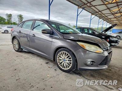 Czwarte zdjęcie samochodu z boku: 2012 FORD FOCUS SEL VIN:1FAHP3H28CL200638 - miniatura