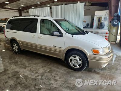 Czwarte zdjęcie samochodu z boku: 2002 PONTIAC MONTANA VIN:1GMDX03E12D230710 - miniatura