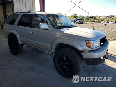 Czwarte zdjęcie samochodu z boku: 1998 TOYOTA 4RUNNER LIMITED VIN:JT3HN87R6W9008703 - miniatura