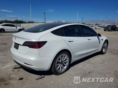 Trzecie zdjęcie samochodu z tyłu: 2021 TESLA MODEL 3 VIN:5YJ3E1EA4MF978725 - miniatura