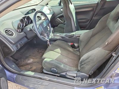 Zdjęcie 7 z 13 samochodu: 2008 MITSUBISHI ECLIPSE GT VIN:4A3AK34T28E025482 - miniatura