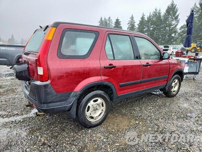 Trzecie zdjęcie samochodu z tyłu: 2002 HONDA CR-V LX VIN:JHLRD78412C050177 - miniatura