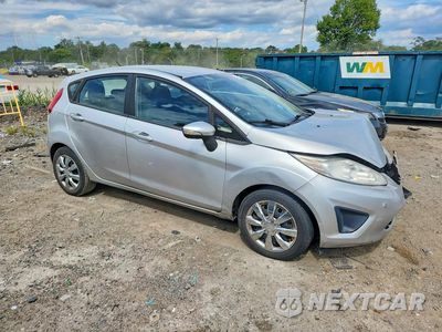 Czwarte zdjęcie samochodu z boku: 2013 FORD FIESTA SE VIN:3FADP4EJ7DM227278 - miniatura