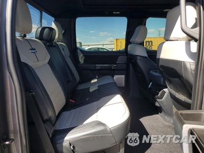 Zdjęcie 10 z 13 samochodu: 2023 FORD F150 LIGHTNING PRO VIN:1FT6W1EV7PWG16482 - miniatura
