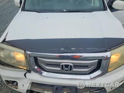 Zdjęcie 12 z 13 samochodu: 2009 HONDA PILOT EXL VIN:5FNYF48529B046212 - miniatura
