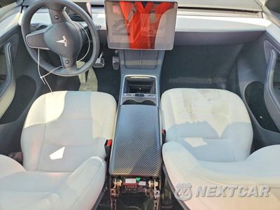 Zdjęcie 8 z 14 samochodu: 2023 TESLA MODEL Y VIN:7SAYGDEE8PA131019 - miniatura