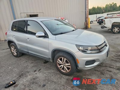 Czwarte zdjęcie samochodu z boku: 2013 VOLKSWAGEN TIGUAN S VIN:WVGAV3AX9DW624705 - miniatura