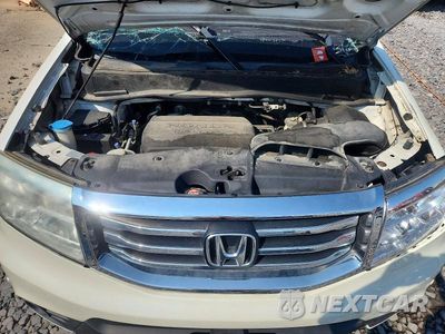 Zdjęcie 12 z 13 samochodu: 2014 HONDA PILOT TOURING VIN:5FNYF4H97EB001151 - miniatura