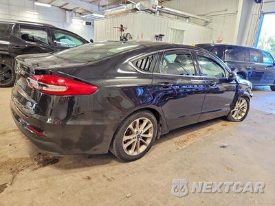 Trzecie zdjęcie samochodu z tyłu: 2019 FORD FUSION SE VIN:3FA6P0LU9KR134258 - miniatura