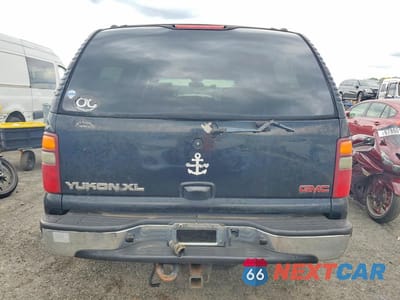 Zdjęcie 6 z 14 samochodu: 2003 GMC YUKON XL K1500 VIN:1GKFK16Z83J104626 - miniatura
