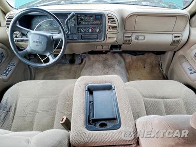 Zdjęcie 8 z 12 samochodu: 1999 GMC SUBURBAN K1500 VIN:1GKFK16R9XJ728425 - miniatura