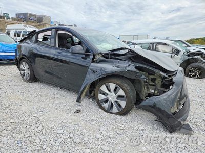 Czwarte zdjęcie samochodu z boku: 2023 TESLA MODEL Y VIN:7SAYGDEE5PA032772 - miniatura