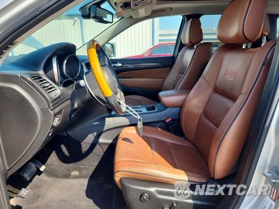 Zdjęcie 7 z 14 samochodu: 2013 JEEP GRAND CHEROKEE OVERLAND VIN:1C4RJECG8DC595940 - miniatura