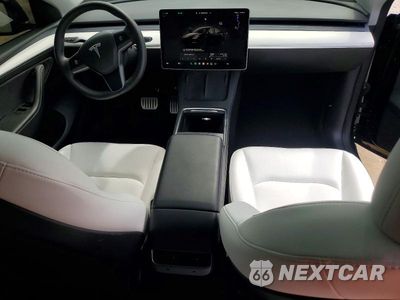 Zdjęcie 8 z 14 samochodu: 2023 TESLA MODEL Y VIN:7SAYGDEF6PF911421 - miniatura