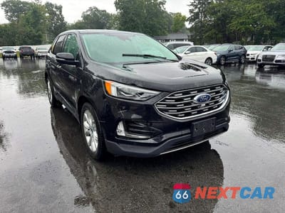 Czwarte zdjęcie samochodu z boku: 2020 FORD EDGE TITANIUM VIN:2FMPK4K99LBB35682 - miniatura