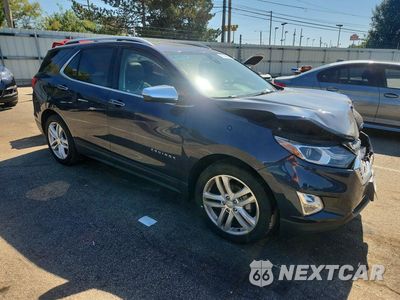 Czwarte zdjęcie samochodu z boku: 2018 CHEVROLET EQUINOX PREMIER VIN:3GNAXMEV5JS510325 - miniatura