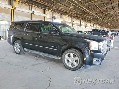 Czwarte zdjęcie samochodu z boku: 2015 GMC YUKON XL DENALI VIN:1GKS1JKJ5FR309571 - miniatura