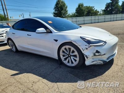 Czwarte zdjęcie samochodu z boku: 2021 TESLA MODEL 3 VIN:5YJ3E1EA6MF052875 - miniatura