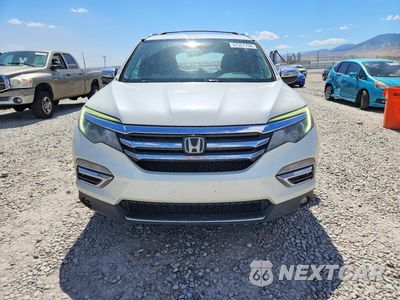 Piąte zdjęcie samochodu w środku: 2016 HONDA PILOT TOURING VIN:5FNYF6H93GB017135 - miniatura