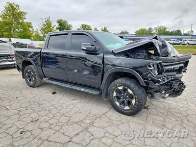 Czwarte zdjęcie samochodu z boku: 2022 RAM 1500 REBEL VIN:1C6SRFLT1NN196426 - miniatura