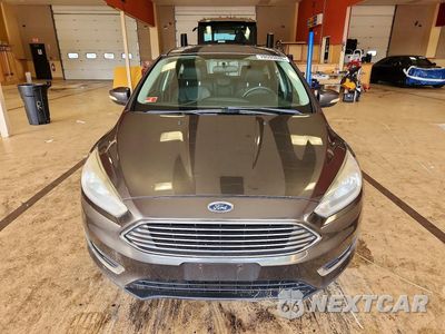 Piąte zdjęcie samochodu w środku: 2016 FORD FOCUS TITANIUM VIN:1FADP3N20GL323424 - miniatura