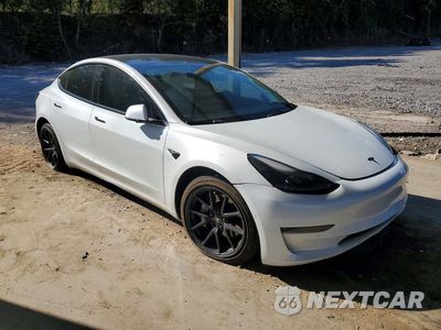 Czwarte zdjęcie samochodu z boku: 2021 TESLA MODEL 3 VIN:5YJ3E1EB4MF903306 - miniatura