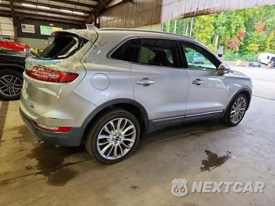 Trzecie zdjęcie samochodu z tyłu: 2015 LINCOLN MKC VIN:5LMCJ1A98FUJ36478 - miniatura