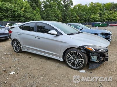 Czwarte zdjęcie samochodu z boku: 2018 HYUNDAI ELANTRA SPORT VIN:KMHD04LB8JU721128 - miniatura