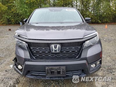 Piąte zdjęcie samochodu w środku: 2021 HONDA PASSPORT EXL VIN:5FNYF8H5XMB030694 - miniatura