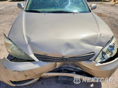 Zdjęcie 11 z 12 samochodu: 2004 TOYOTA CAMRY LE V6 VIN:JTDBF32K240154108 - miniatura