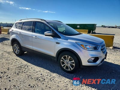 Czwarte zdjęcie samochodu z boku: 2018 FORD ESCAPE SE VIN:1FMCU9GD7JUC41025 - miniatura