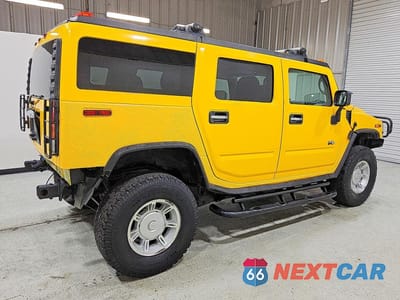 Trzecie zdjęcie samochodu z tyłu: 2003 HUMMER H2 VIN:5GRGN23U13H146938 - miniatura