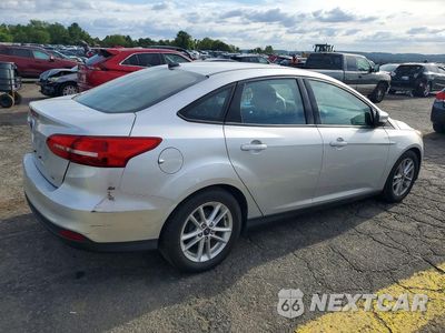 Trzecie zdjęcie samochodu z tyłu: 2016 FORD FOCUS SE VIN:1FADP3F21GL342594 - miniatura