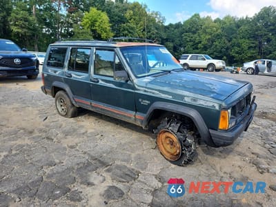 Czwarte zdjęcie samochodu z boku: 1994 JEEP CHEROKEE SPORT VIN:1J4FJ68SXRL148162 - miniatura