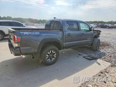 Trzecie zdjęcie samochodu z tyłu: 2023 TOYOTA TACOMA TRD OFF-ROAD VIN:3TMCZ5ANXPM541509 - miniatura