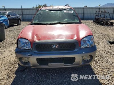 Piąte zdjęcie samochodu w środku: 2004 HYUNDAI SANTA FE GLS VIN:KM8SC13E44U639831 - miniatura