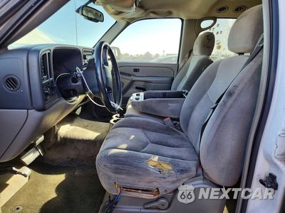 Zdjęcie 7 z 13 samochodu: 2004 CHEVROLET TAHOE C1500 VIN:1GNEC13V44J161856 - miniatura