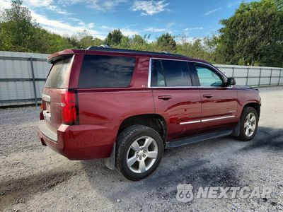 Trzecie zdjęcie samochodu z tyłu: 2020 CHEVROLET TAHOE K1500 LT VIN:1GNSKBKC1LR132715 - miniatura