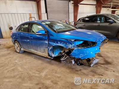 Czwarte zdjęcie samochodu z boku: 2016 FORD FOCUS SE VIN:1FADP3F20GL357717 - miniatura