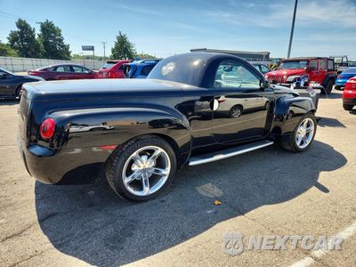 Trzecie zdjęcie samochodu z tyłu: 2004 CHEVROLET SSR VIN:1GCES14P84B110124 - miniatura