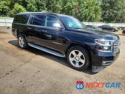 Czwarte zdjęcie samochodu z boku: 2015 CHEVROLET SUBURBAN C1500 LTZ VIN:1GNSCKKC9FR263117 - miniatura