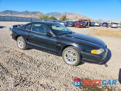 Czwarte zdjęcie samochodu z boku: 1998 FORD MUSTANG GT VIN:1FAFP42X7WF195663 - miniatura