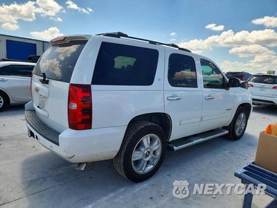 Trzecie zdjęcie samochodu z tyłu: 2013 CHEVROLET TAHOE C1500 LT VIN:1GNSCBE09DR269806 - miniatura