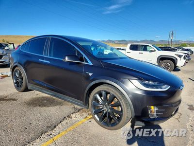 Czwarte zdjęcie samochodu z boku: 2017 TESLA MODEL X VIN:5YJXCBE28HF043011 - miniatura