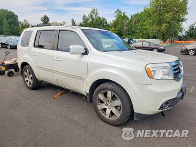 Czwarte zdjęcie samochodu z boku: 2014 HONDA PILOT TOURING VIN:5FNYF4H9XEB017165 - miniatura